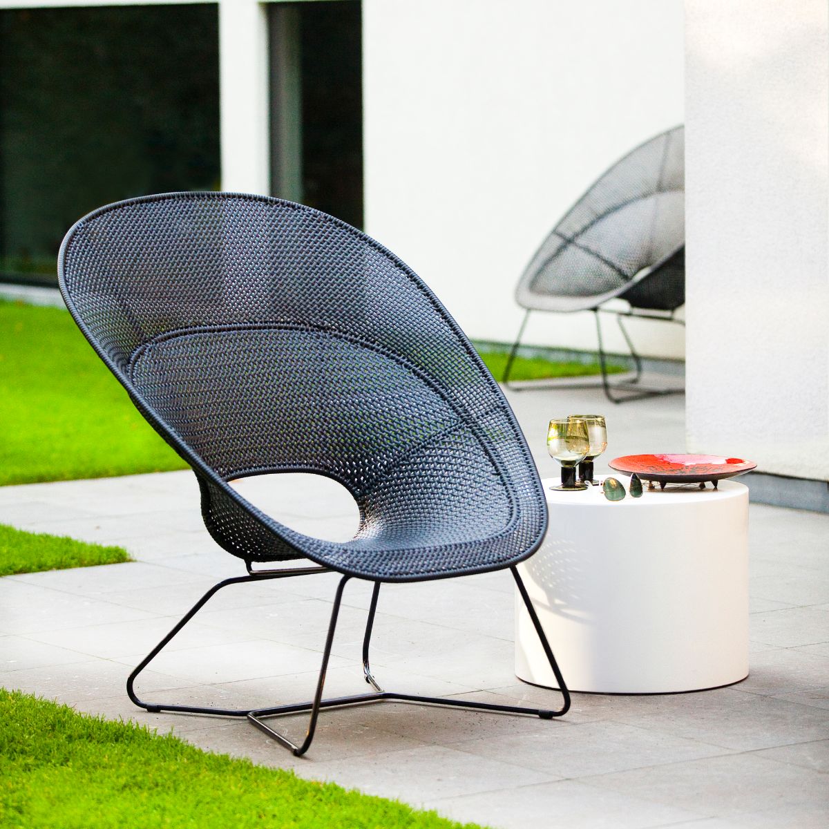Feelgood Designs Tornaux lounge & footstool black frame/rattan peel outdoor
