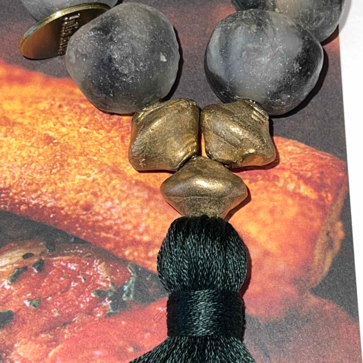 Studio Julia Atlas - Ice grey recycled glass Ghana, bronze, cotton tassel - mini
