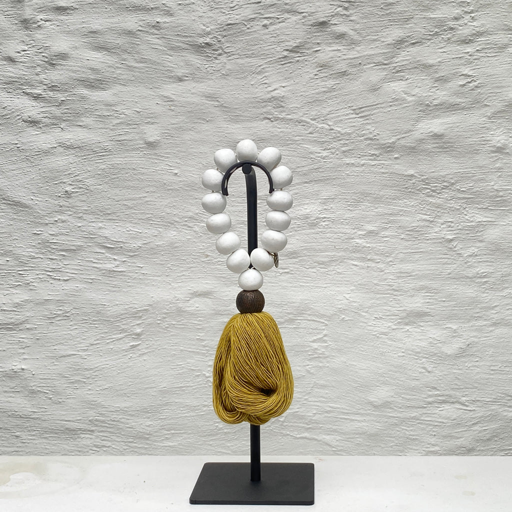 Studio Julia Atlas - Rare white glass Ghana, bronze, merino wool tassel